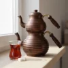 dilimli-caydanlik-2-no-kalin-el-dovme-oksit-bb1958-3-sahne-1 El yapımı bakır çaydanlık — Dilimli Bakır Çaydanlık 2 No Kalın El Dövme Oksit — çay demleme ve servis — BakırBul